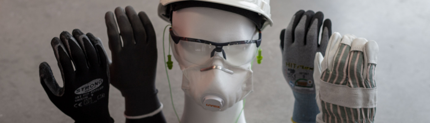 Schutzausrüstung mit Atemschutzmaske, Handschuhen, Schutzbrille, Gehörschutz und Schutzhelm